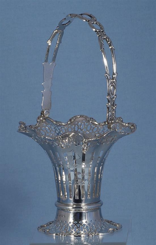 A George V silver swing handled trumpet shaped basket, Height 235mm weight 6.6oz/207grms